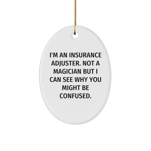 Insurance Adjuster Gifts from Friends to Family, Funny Oval Ornament for Christmas Unique Gifts, 'I'm An Insurance Adjuster. Not A Magician...' - Image 1