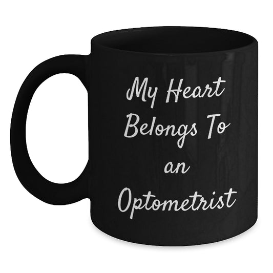 Funny Black Coffee Mug Gifts from Friends and Family to an Amazing Optometrist - 'My Heart Belongs To An Optometrist' Quote - Main