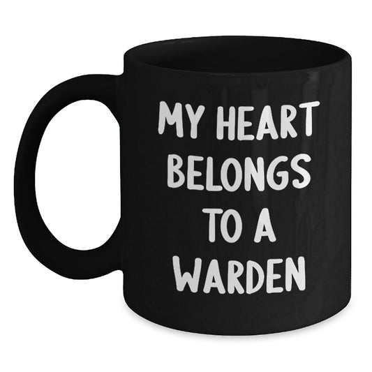 Funny Warden Gifts from Friends Christmas Unique Mug, 'My Heart Belongs To A Warden', Black Coffee Mug for Warden Lover - Main