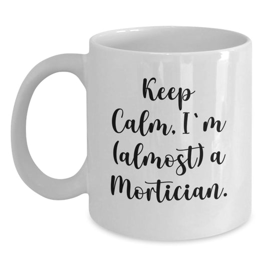 Funny Mortician Gifts from Friends, White Coffee Mug for Mortician, Keep Calm I'm almost A Mortician Christmas Unique Mugs - Main