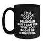 Doctors Gifts from Friends and Family, Unique Birthday Mug for Medical Professionals, Funny Black Coffee Mug, 'I'm A Doctor. Not A Magician But I Can See Why You Might Be Confused.' - Main
