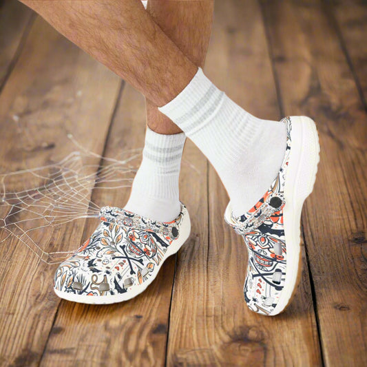Patterned shoes worn with white socks on a white background
