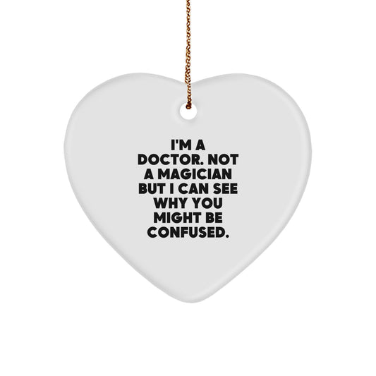 Funny Doctor Gifts for Him - 'I'm A Doctor. Not A Magician...' Heart Ornament, White, 2.75'' tall, Gifts from Men, for Doctor - Image 1