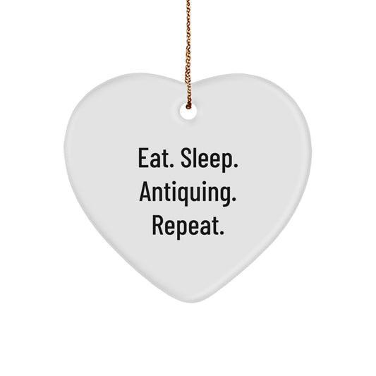 'Eat. Sleep. Antiquing. Repeat.' Antiquing Heart Ornament, Gifts from Family for Antiquing Enthusiasts, White, Heart Shaped, Perfect for Christmas - Image 1