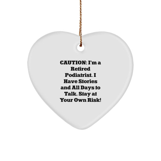 Funny Podiatrist Gifts from Friends and Family - Heart Ornament with Quote Caution: I'm A Retired Podiatrist. I Have Stories And All Days To Talk. Stay At Your Own Risk! for Christmas - Image 1