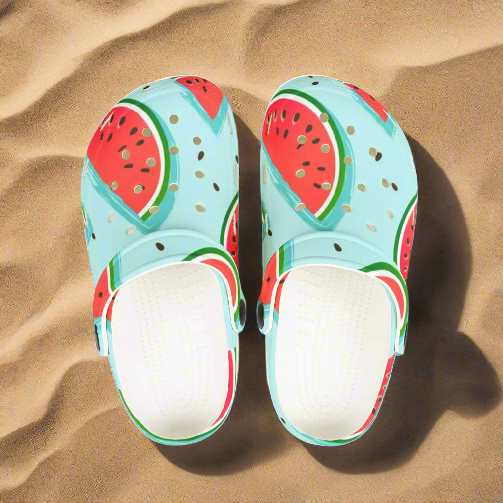 Pair of clogs with watermelon design on a white background