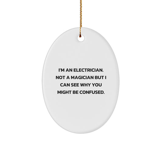 Funny Electrician Gifts for Christmas - 'I'm An Electrician. Not A Magician' Oval Ornament from Friends or Family - Image 1