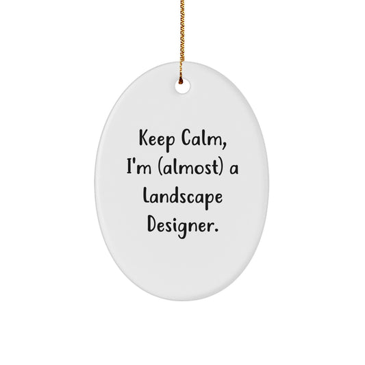 Funny Landscape Designer Gifts for Friends - Keep Calm I'm (almost) A Landscape Designer Christmas Ornament, Oval Shaped MDF with Gold Cord - Image 1