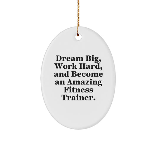 Gifts from Friends to Fitness Trainers - 'Dream Big, Work Hard, And Become An Amazing Fitness Trainer.' Oval Ornament for Christmas, Fitness Trainer Gifts, Oval Ornament, Fitness Trainer Motivation - Image 1